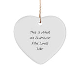 Funny Pilot Gifts from Friends for Christmas - Heart Ornament with 'This Is What An Awesome Pilot Looks Like' Quote - Image 1